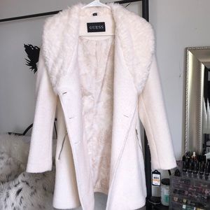 Cream white coat from Guess with faux fur trim.